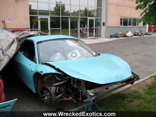 Illustration for article titled Wrecked Ferrari 458 Italias Hide Shame Under Tarps